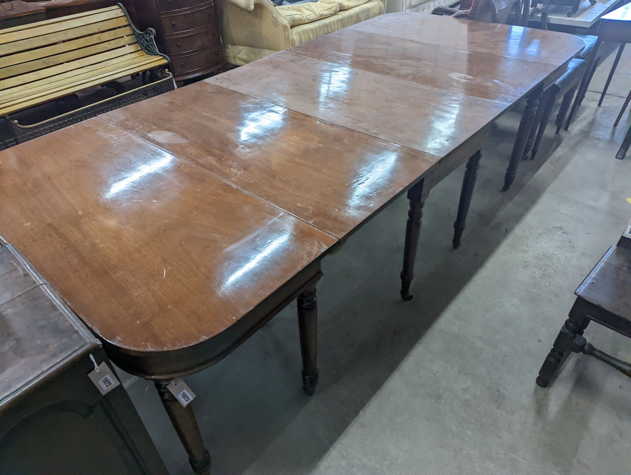 A George IV mahogany D end drop leaf extending dining table, 266cm extended, width 121cm, height 74cm